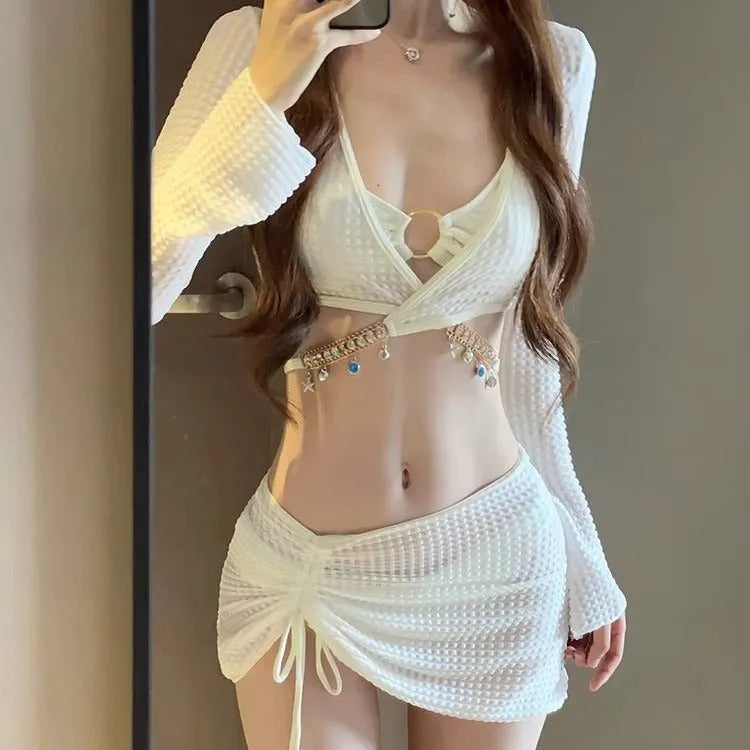 Women's long sleeve black and white bikini swimsuit with split bottoms for swimming