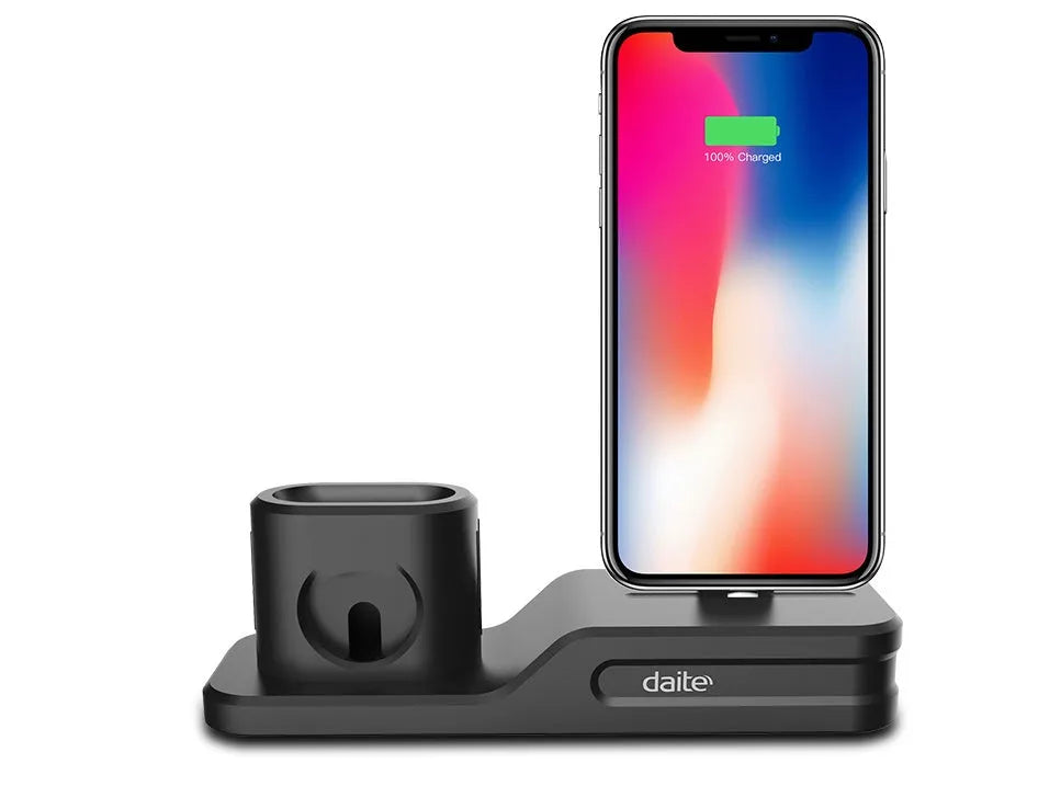 Black geometric 3-in-1 charging stand for Apple iPhone, Watch, and AirPods on a desk.