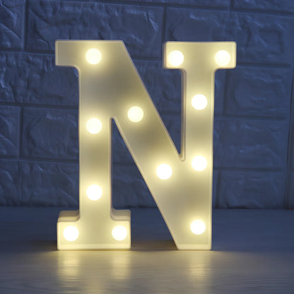 White plastic LED alphabet marquee sign with warm white illumination, 22cm height with battery operation