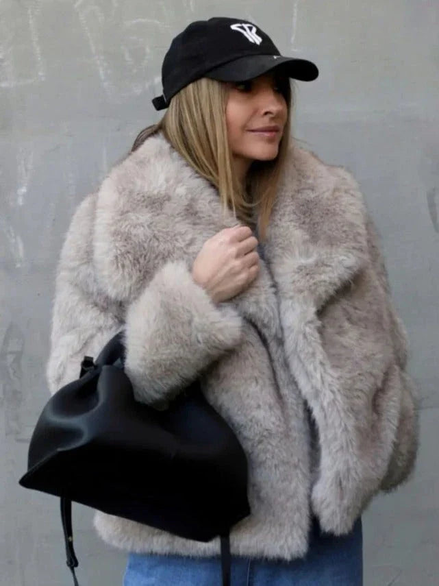 Cozy plush winter coat for women, available in a range of stylish colors