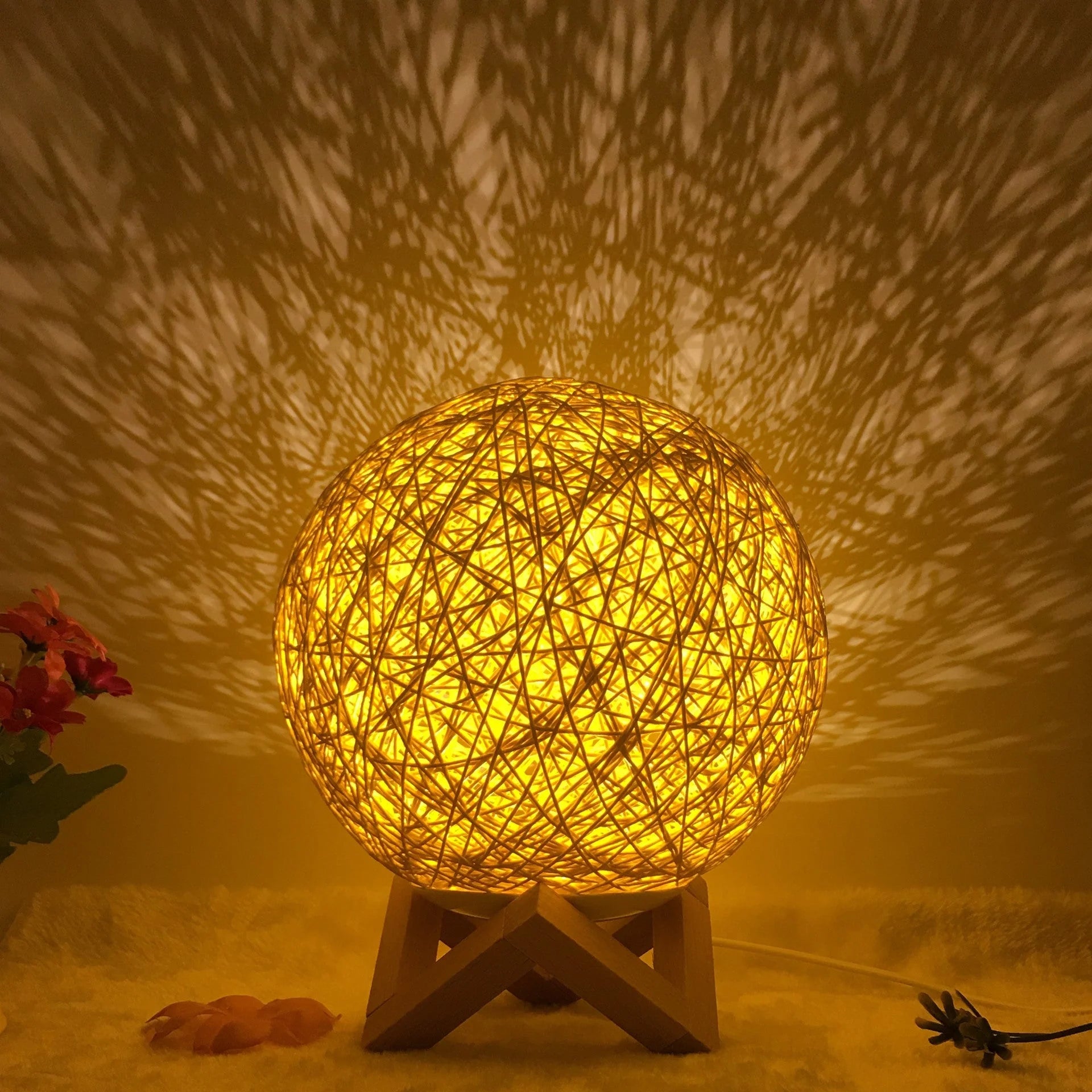 LED rattan table lamp with hand-knit lampshade in various colours