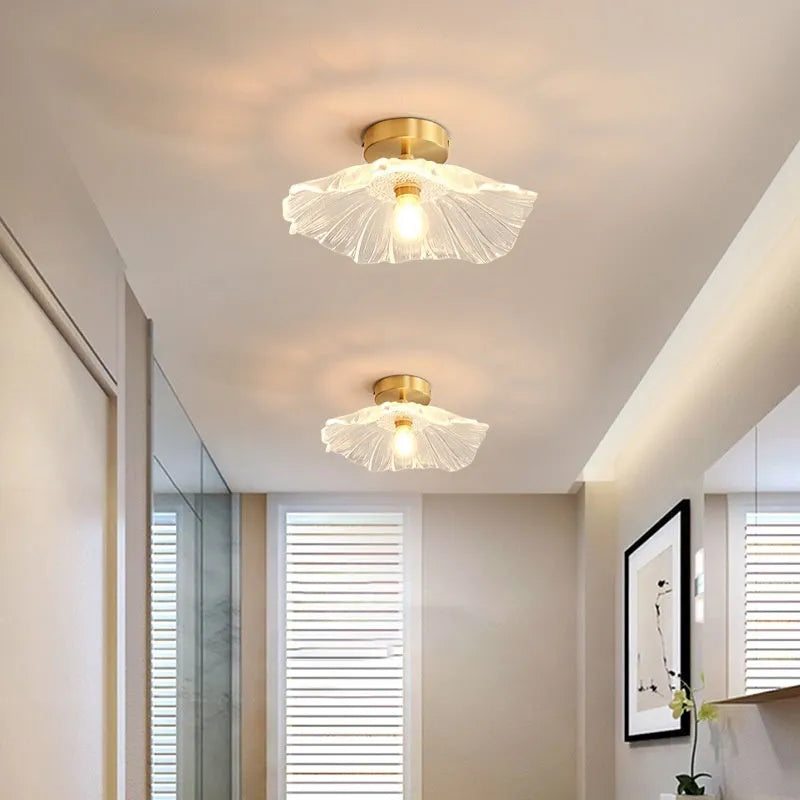 Nordic Japanese style Lotus Leaf Lamp with iron body and glass shade, shown as a pendant light