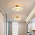 Nordic Japanese style Lotus Leaf Lamp with iron body and glass shade, shown as a pendant light