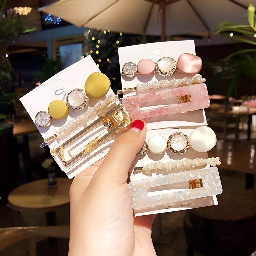 Acrylic pearl hair clip set in various colours including blue, green, pink, purple, white, and yellow
