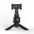 Black 360 degree rotating mobile phone holder on a desk, ABS construction with full rotation capability