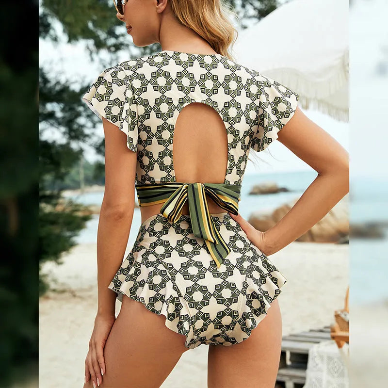 Green flounced backless bikini set with lace-up back and V-neck split top.