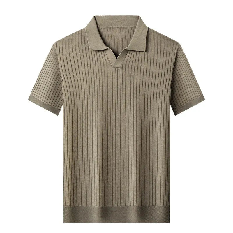 Man wearing a striped mulberry silk lapel T-shirt in grey, showing short sleeves and a straight fit.