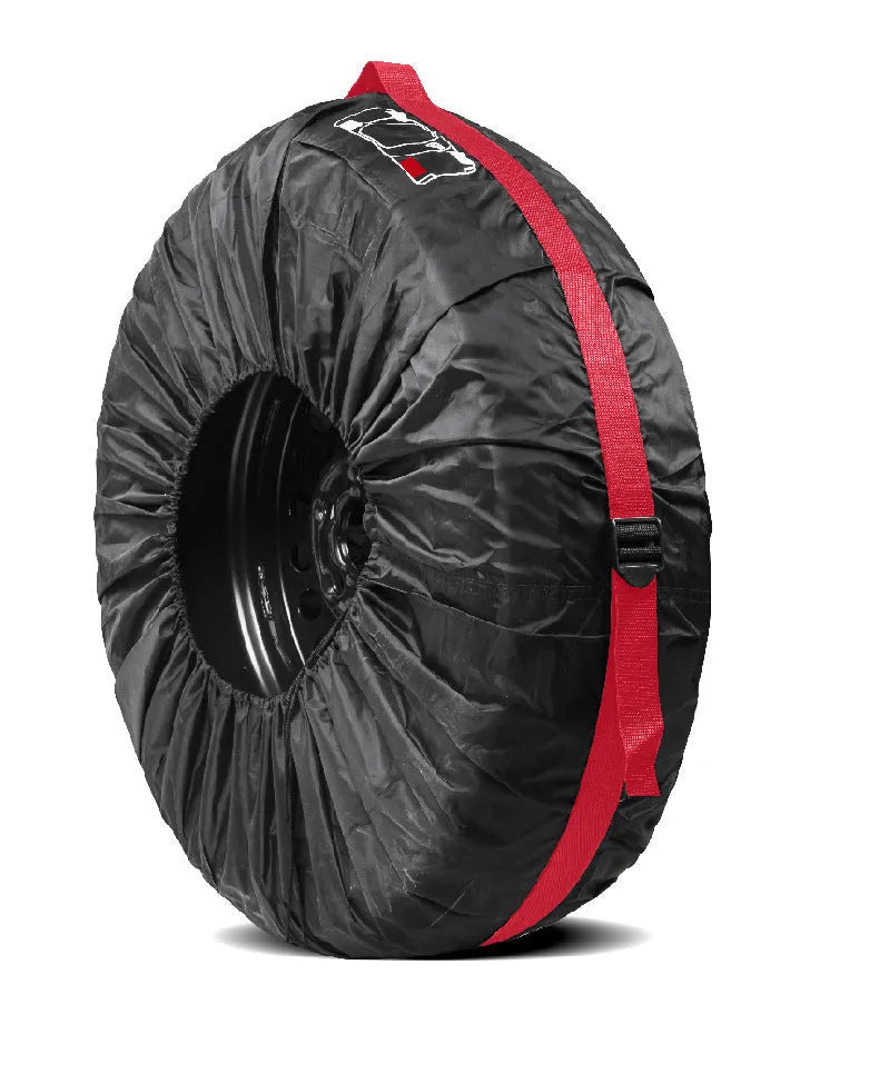Four black Oxford cloth tyre protective covers laid flat, showing their circular shape and belt-style detailing.