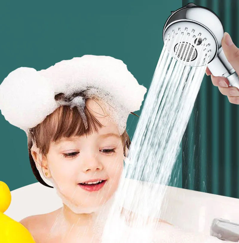 Silver ABS plastic handheld shower head for gentle pet and baby baths.