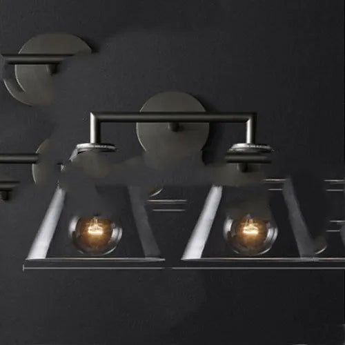 Modern wrought iron glass wall lamp with E27 socket in gold bronze finish with triangular transparent shade