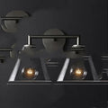 Modern wrought iron glass wall lamp with E27 socket in gold bronze finish with triangular transparent shade