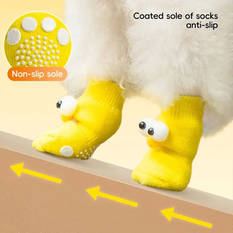 Dog all-season universal cotton socks with cute big eyes, anti-slip sole, green colour, side view on wooden floor