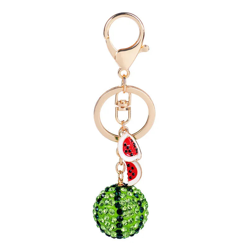 Green zinc alloy watermelon slice keychain measuring 12cm.