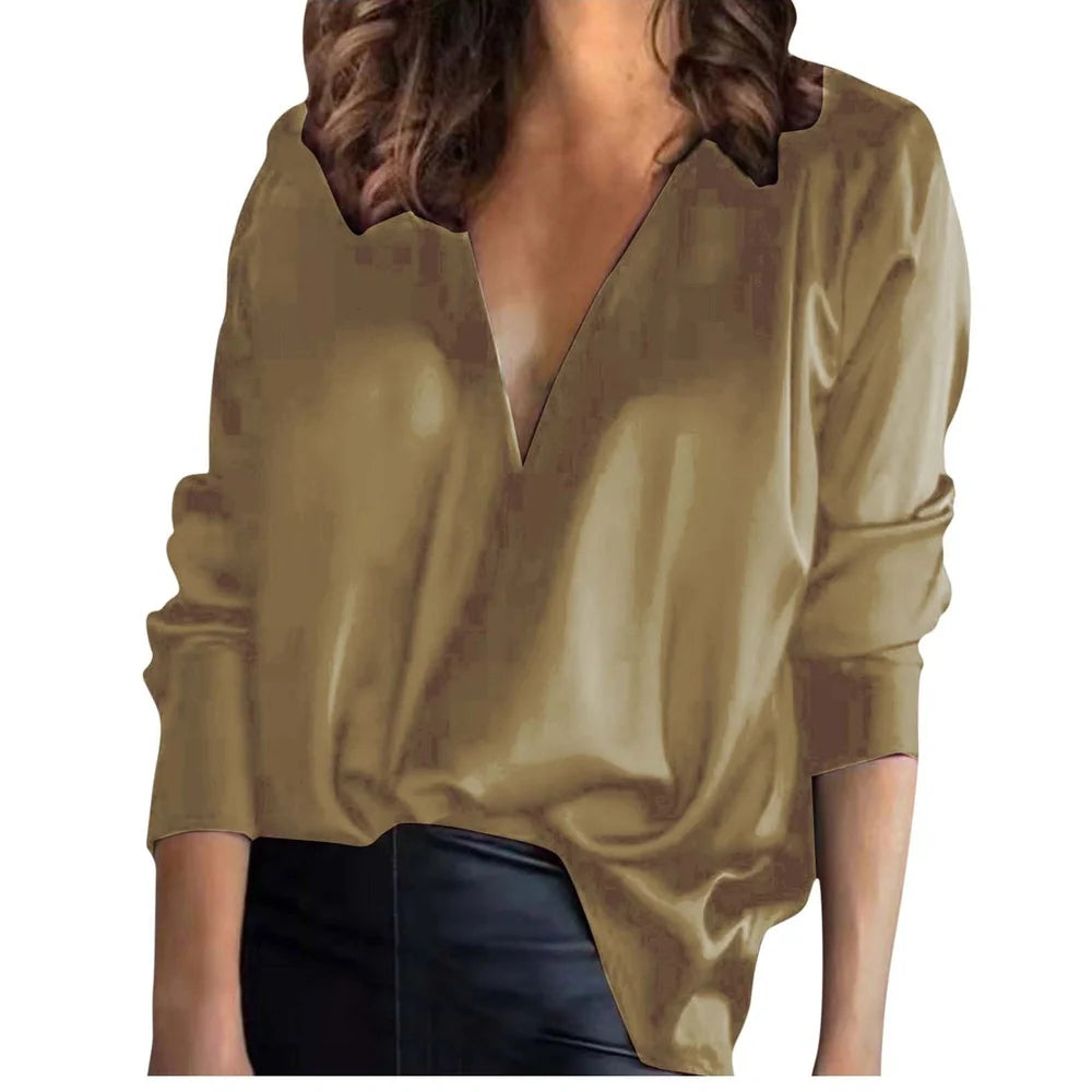 Women's green satin long-sleeved shirt with nine-quarter sleeves on hanger