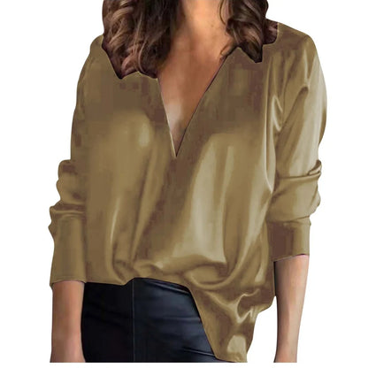 Women's green satin long-sleeved shirt with nine-quarter sleeves on hanger
