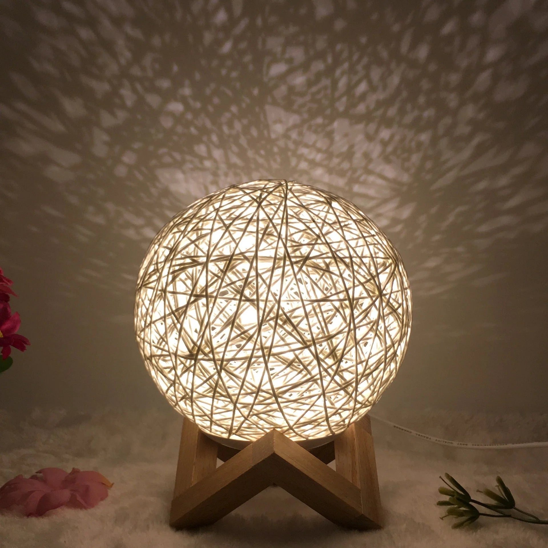 LED rattan table lamp with hand-knit lampshade in various colours