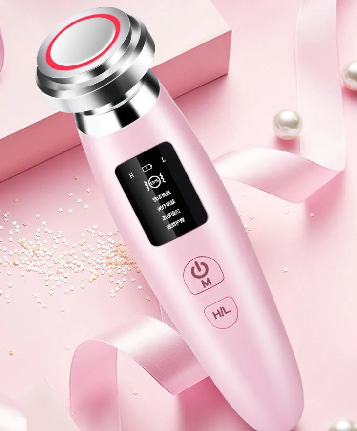 Pink handheld facial cleansing and rejuvenation beauty instrument with micro-current technology