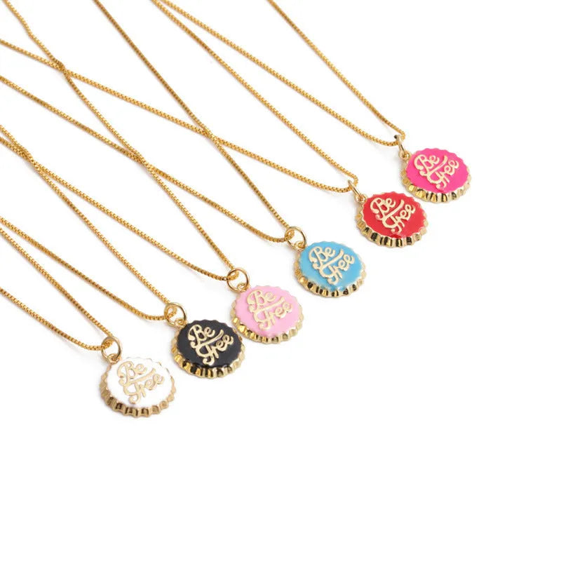 Copper Be Free bottle cap pendant necklace on a 40cm box chain with gold electroplating.