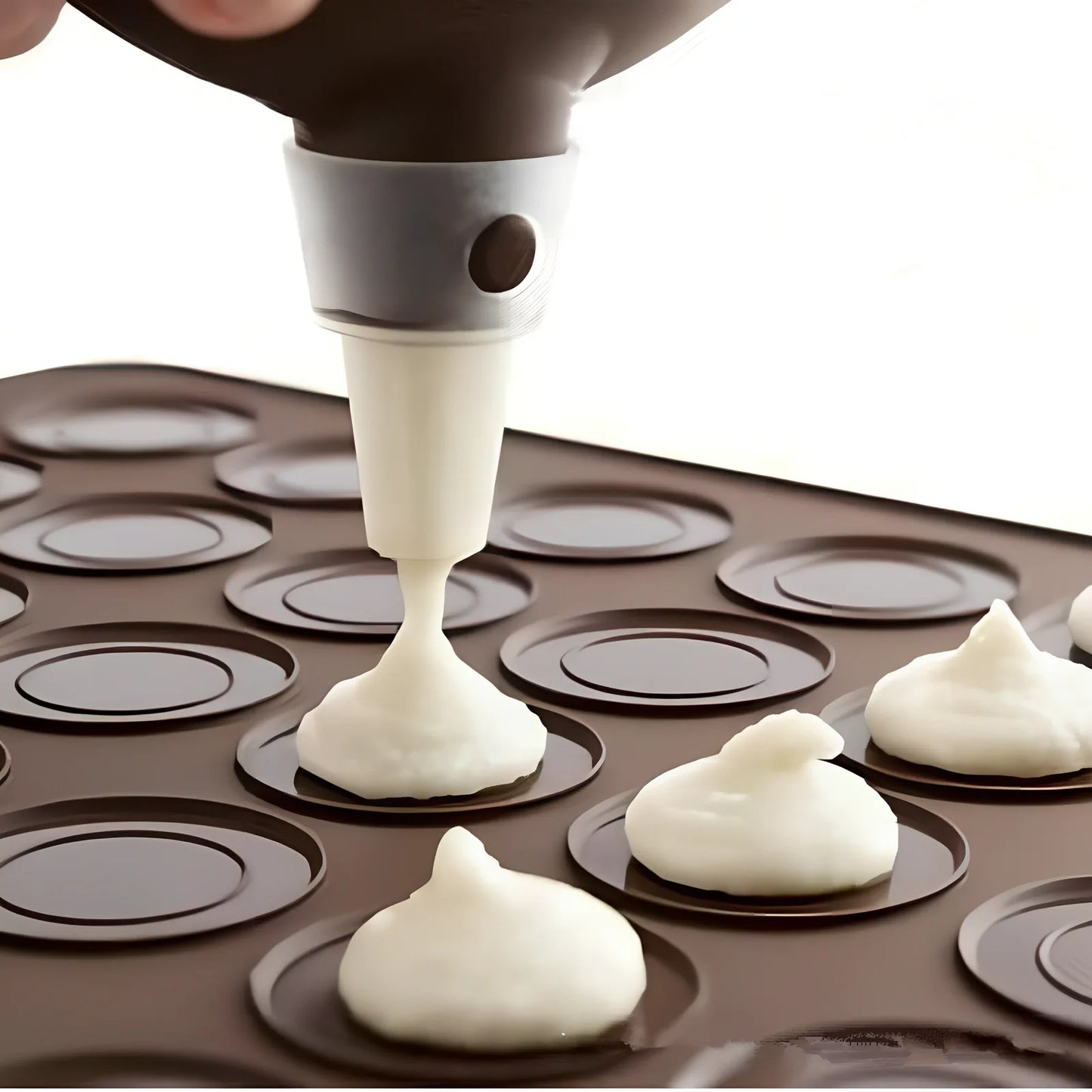 Brown silicone baking mat 29.5 cm x 21.5 cm with 2.3 cm and 3.7 cm circles for non-stick oven baking