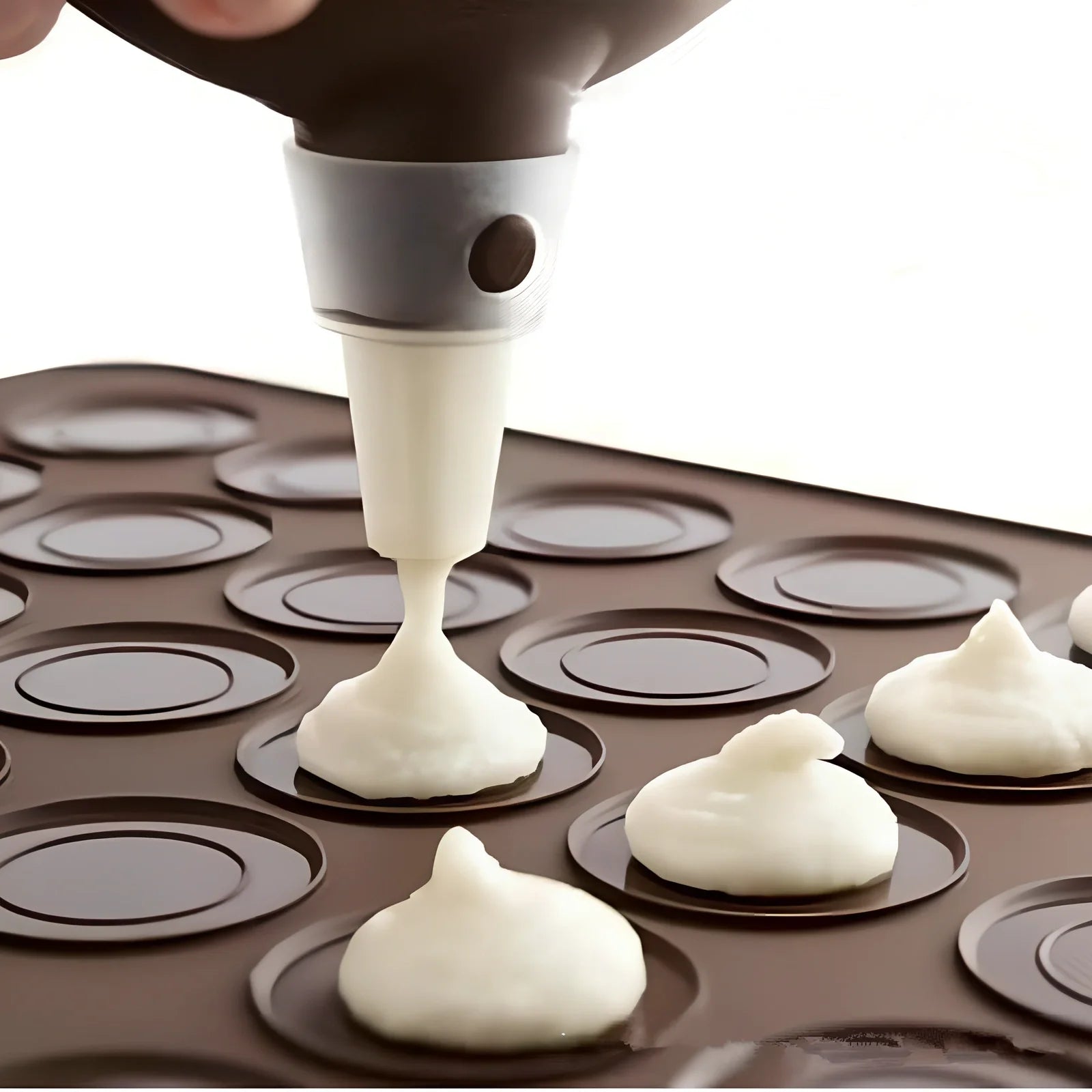 Brown silicone baking mat 29.5 cm x 21.5 cm with 2.3 cm and 3.7 cm circles for non-stick oven baking