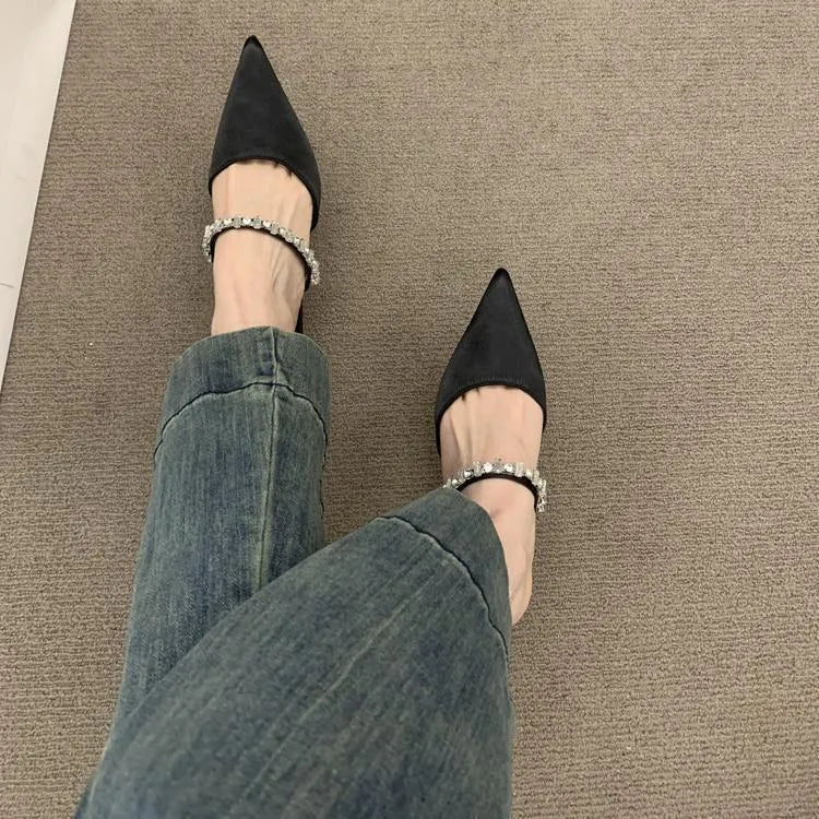 Black women's rhinestone pointed toe half slippers with suede upper and rubber sole