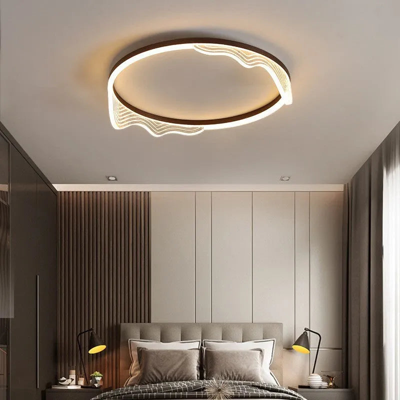 Acrylic ceiling light with remote control, 50cm diameter, gold finish, on a white ceiling