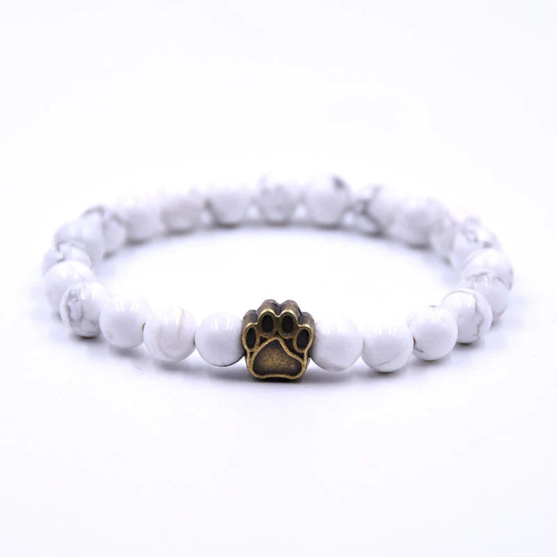Natural stone dog paw bracelet featuring tiger eye and volcanic stone in a unisex design