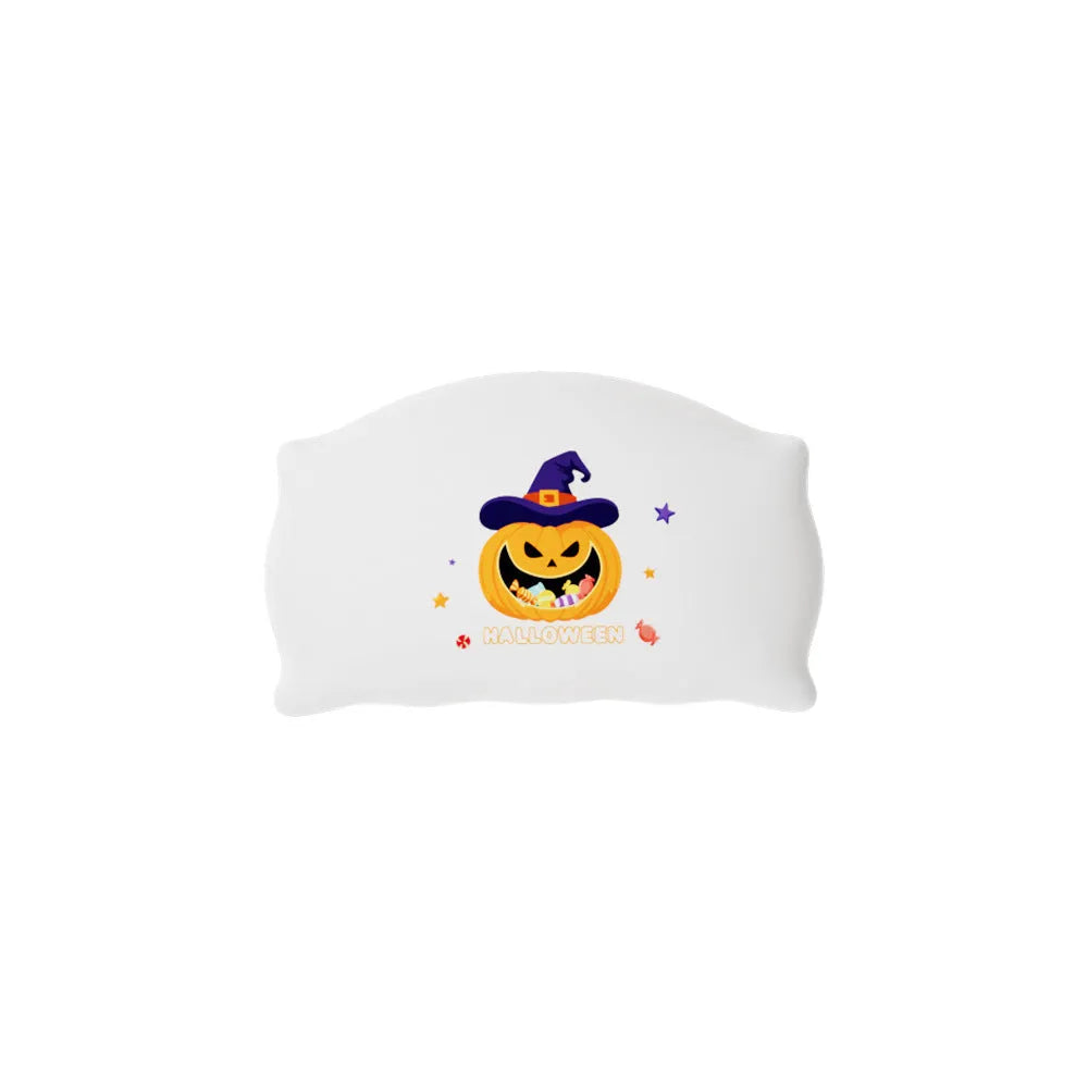 Cartoon Halloween ghost or pumpkin doll table lamp with warm white LED light on a table.