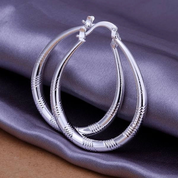 Silver-plated copper hoop earrings with 925 silver treatment, 3.9cm by 3.2cm