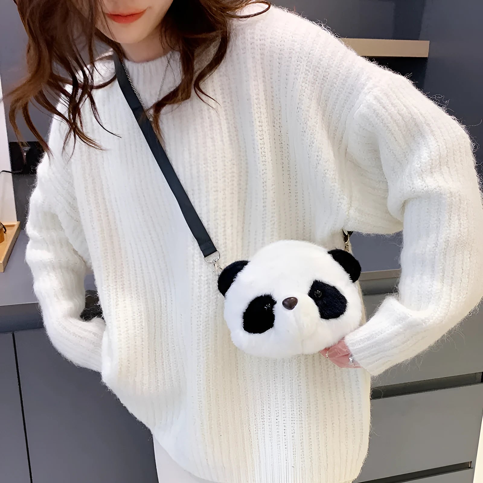 Soft plush panda head design cylindrical crossbody messenger bag with a sandwich pocket.
