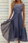Women's sleeveless green chiffon dress with lace hollow-out stitching detail, midi length.