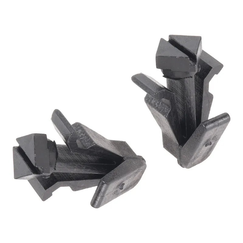 Black plastic bumper cover radiator grille fastening clip for Nissan vehicles, part number 76882-0M060