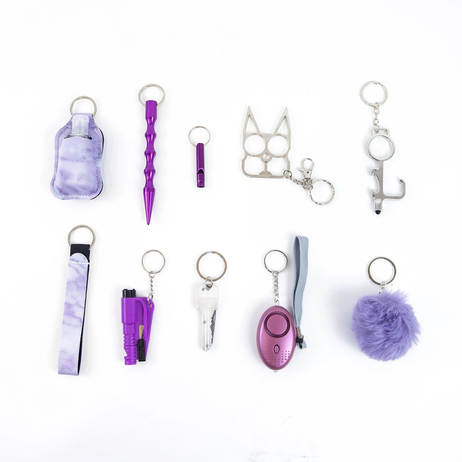 Self-defense keychain set for women with 11 safety tools including alarm, window breaker, and whistle