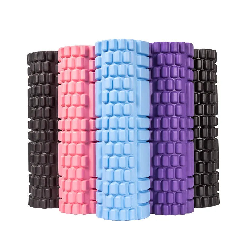 EVA foam roller in black, shown next to smaller pink and sky blue rollers of different sizes.