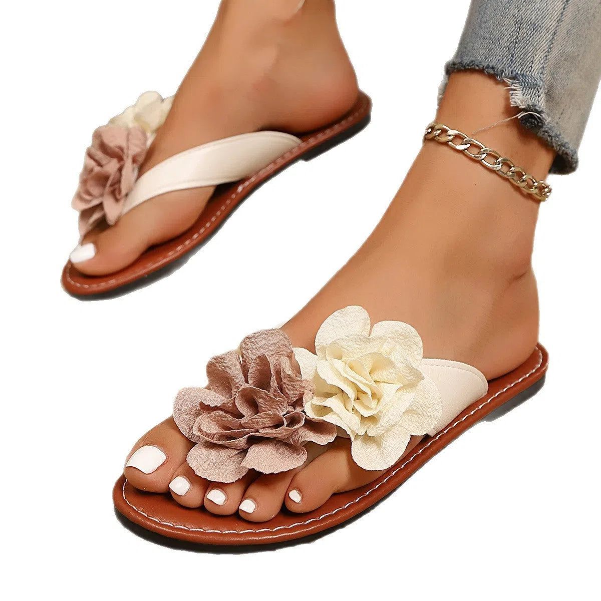 Beige women's flip flop sandals with adjustable strap and two-way flower design on PU upper