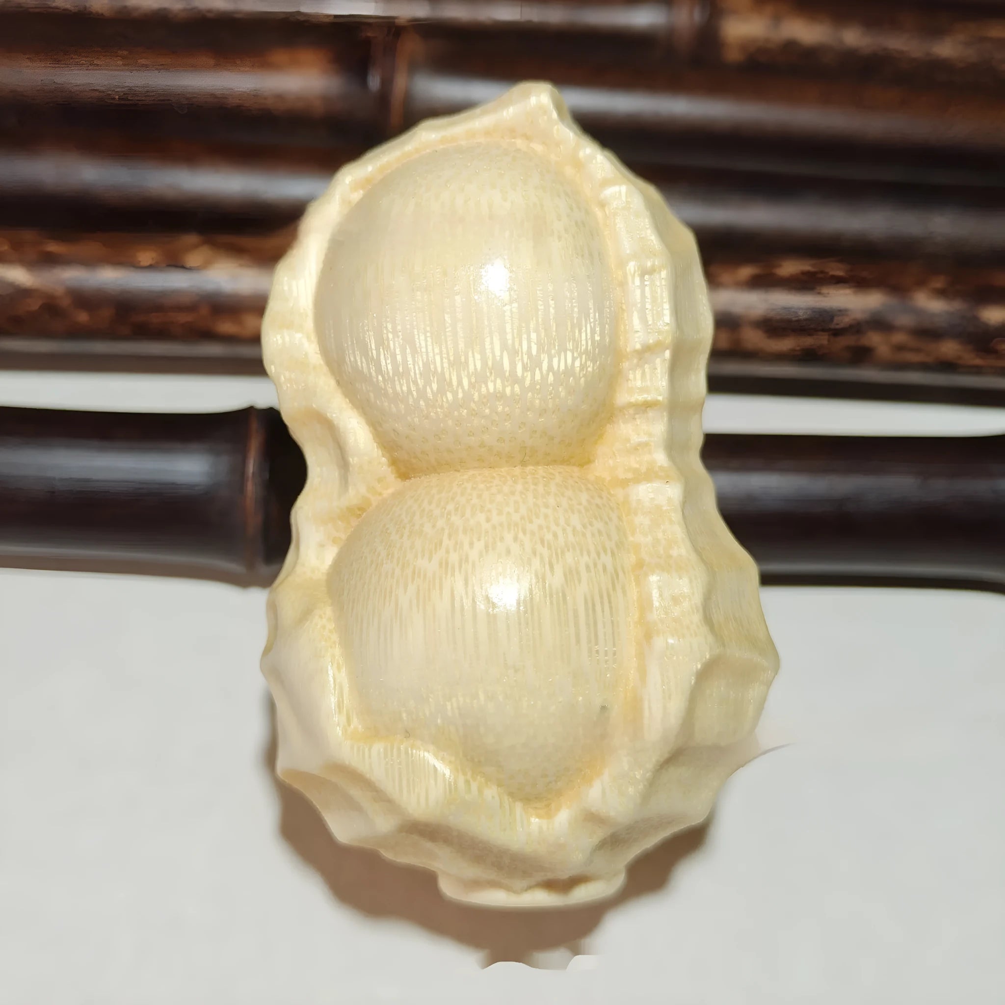 Solid bamboo carving peanut ornament in modern simple style for gift giving