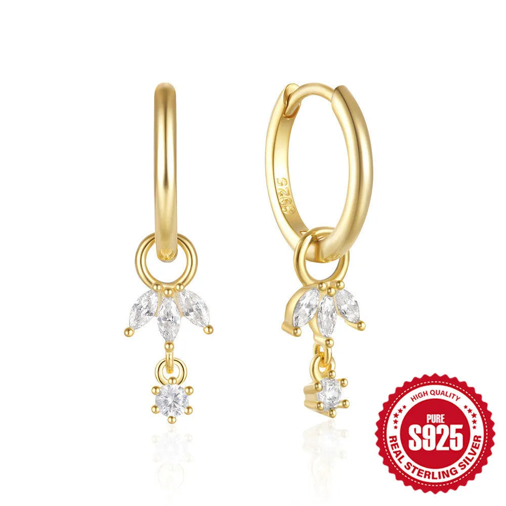 Golden S925 sterling silver sunflower stud earrings with geometric shape and inlaid zircon stones.