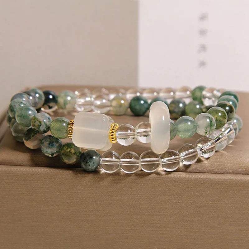 Double circle green grass agate and white agate cube sugar bracelet on a neutral background