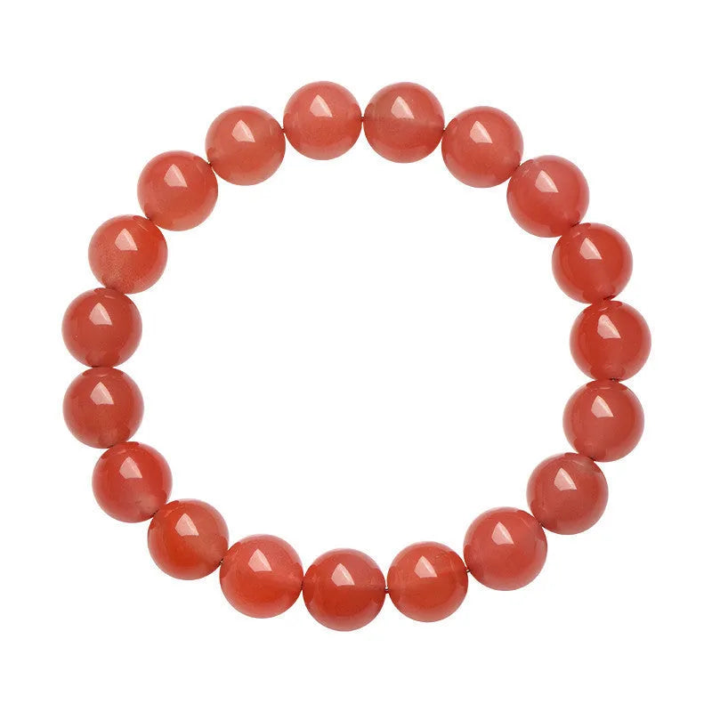 Natural South Red Cherry Agate bracelet on a wrist, showing polished beads in a single strand design.