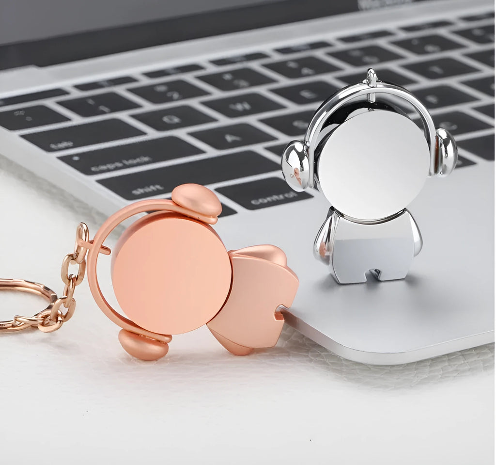 Personalised metal USB flash drive with cartoon musician design in silver and rose gold finishes