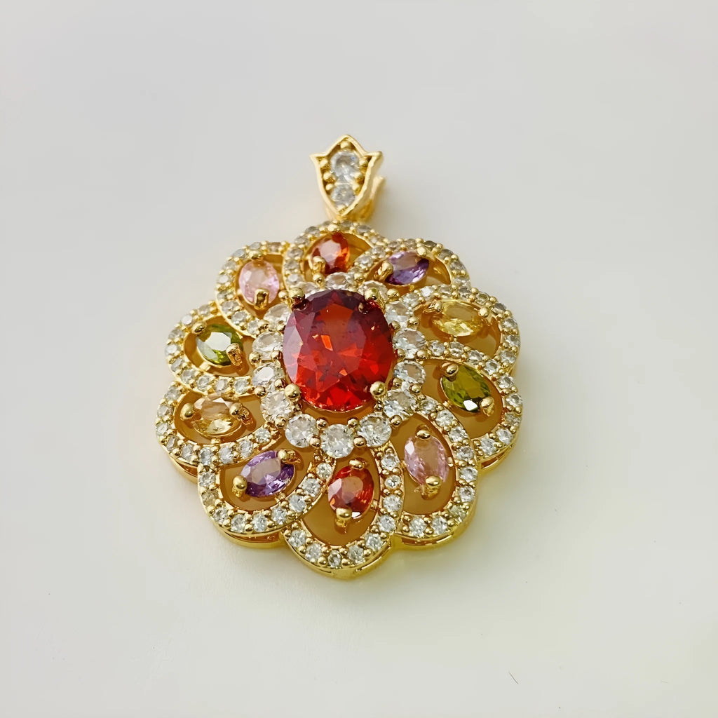 Close-up of a women's flower-shaped zircon pendant necklace in a gold tone on a model.