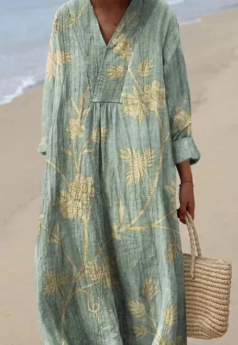 Casual long floral shirt dress with 3D print, wide waist, and regular sleeves on a hanger.