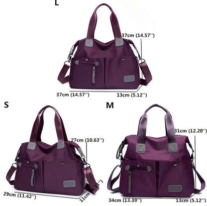 Ladies shoulder bag in black Oxford fabric, size M with multiple pockets and adjustable straps for handbag or crossbody carry, 340 mm width