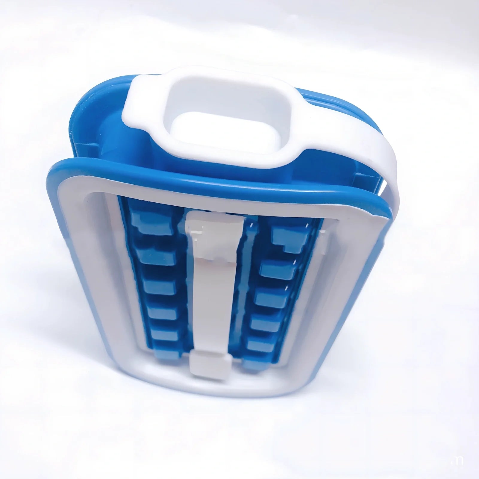 Blue silicone ice cube tray with 36 compartments making slow-melting 25mm cubes for cocktails