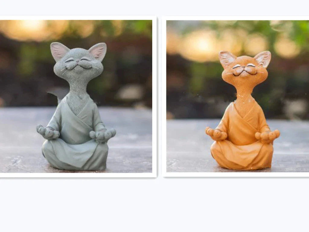 Charming ceramic Buddha cat figurine in black, grey, and orange colors for meditation, yoga, and home decor