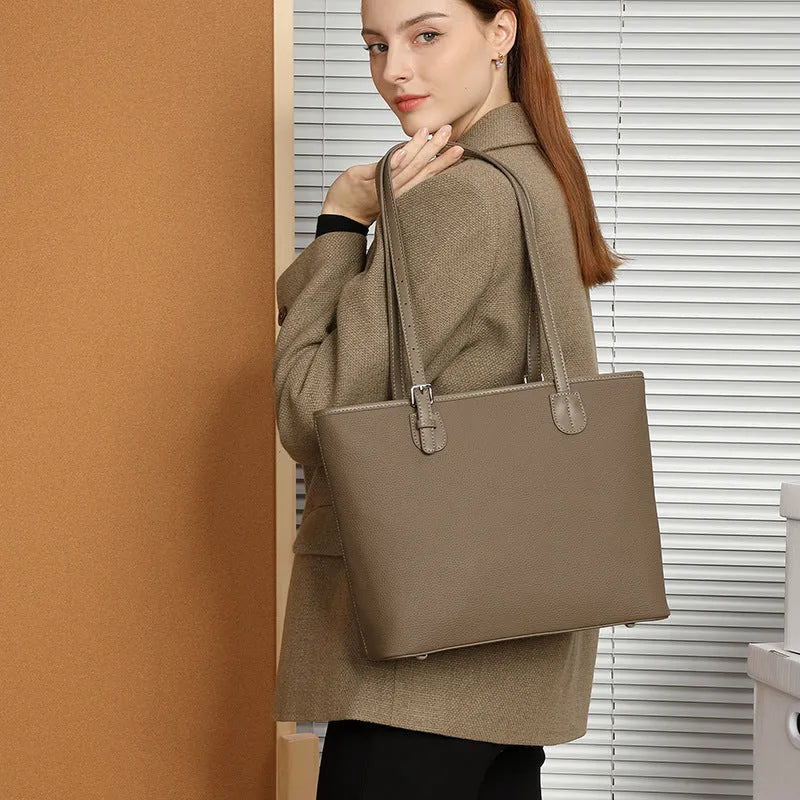 Genuine leather women's tote bag in retro square style with internal organiser pockets.
