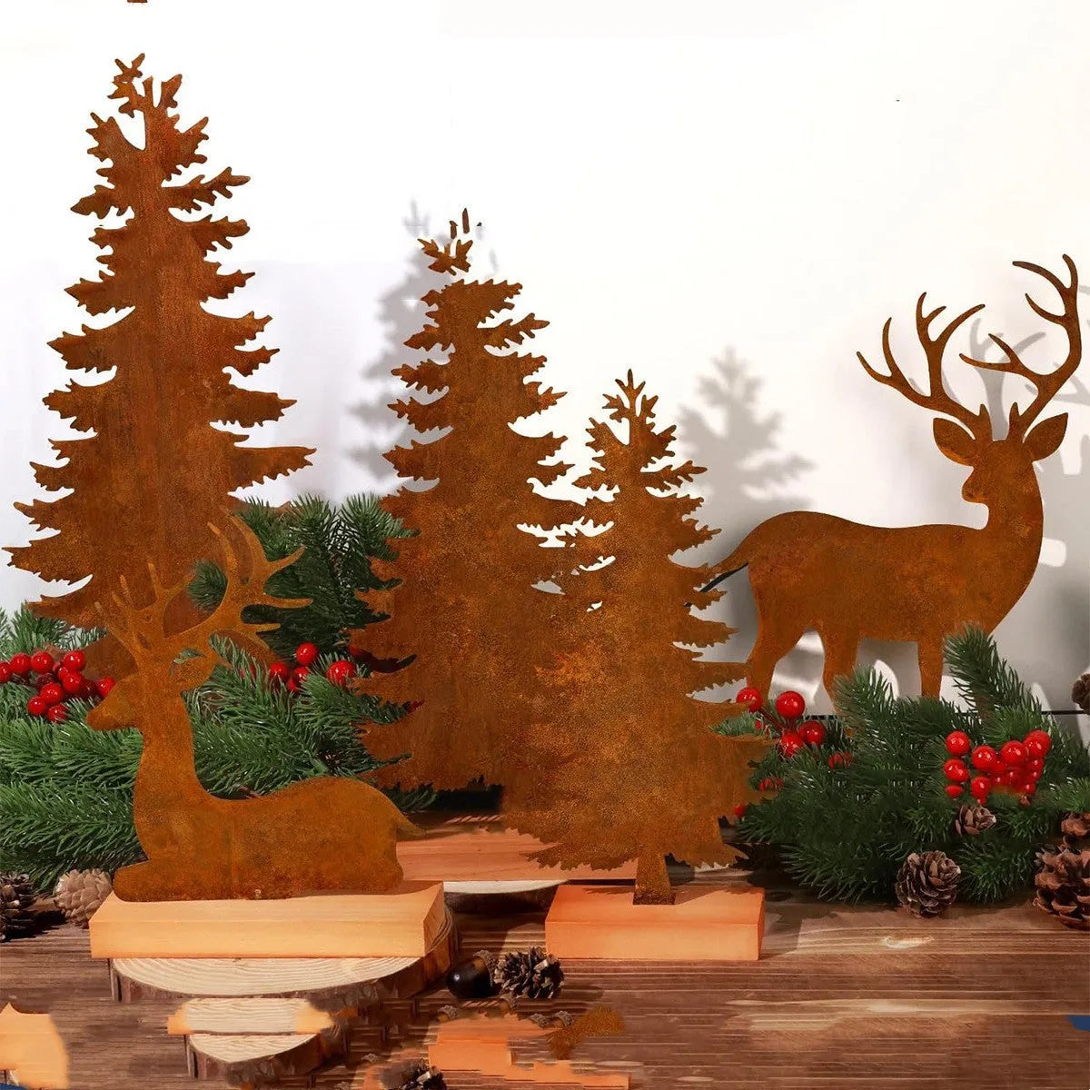 Three rustic iron metal Christmas tree ornaments featuring elk silhouettes, American style.