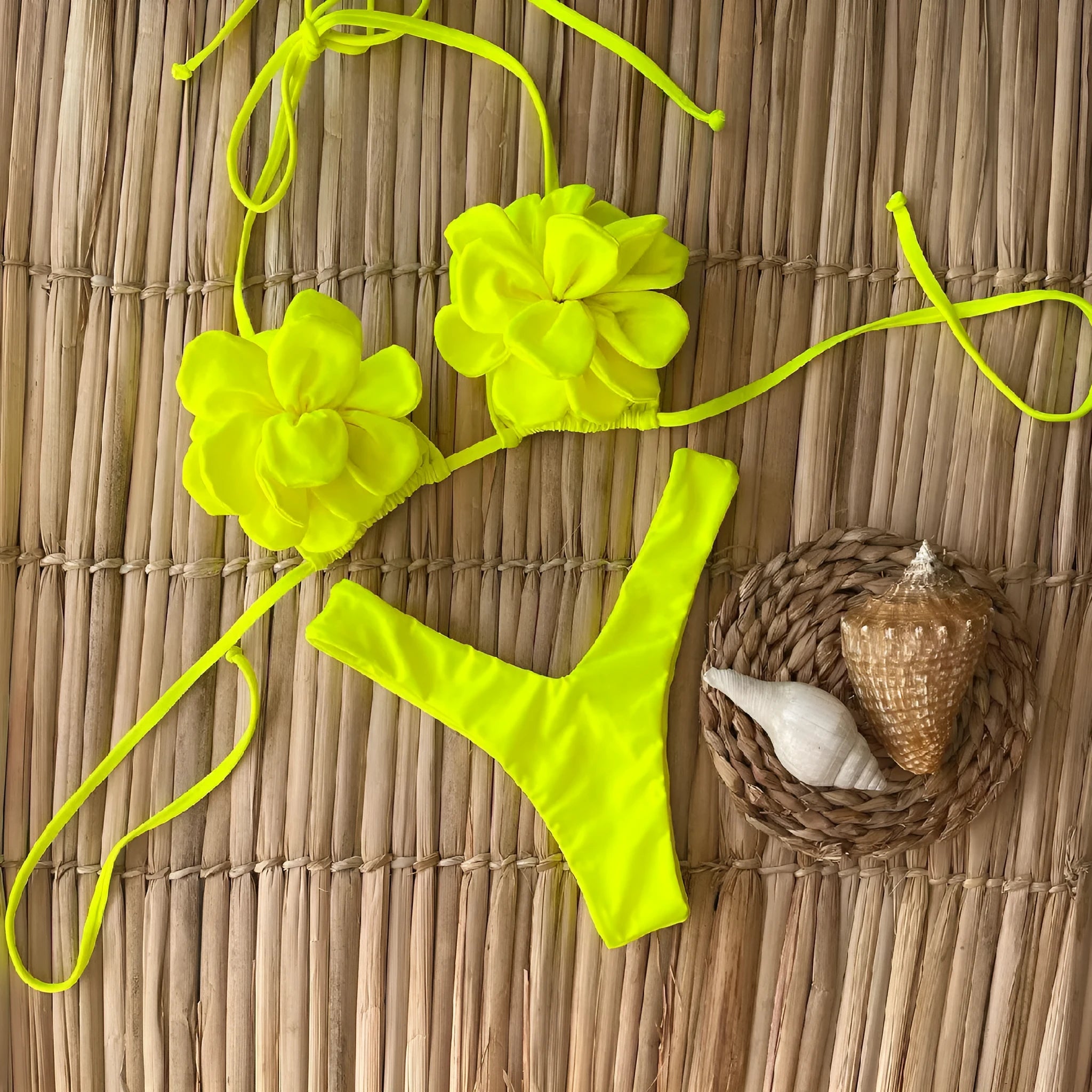 Low waist bikini swimsuit with 3D flower design in solid colour