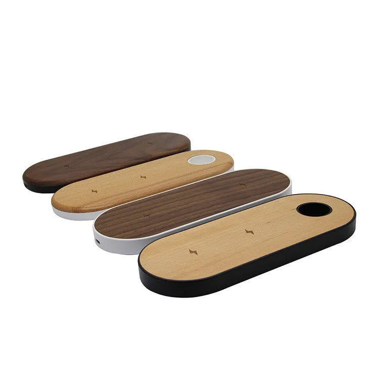 A wooden wireless charging pad made from bamboo with beech wood edging on a desk.