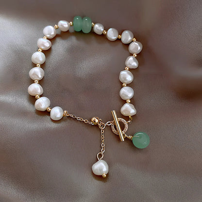 Pink irregular freshwater pearl bracelet on alloy chain, adjustable 16-22cm with 8-12mm beads